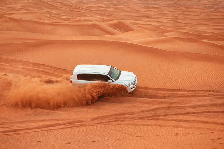 Red Dunes Morning Safari: Dune Bashing, Camel Ride and Quad Biking