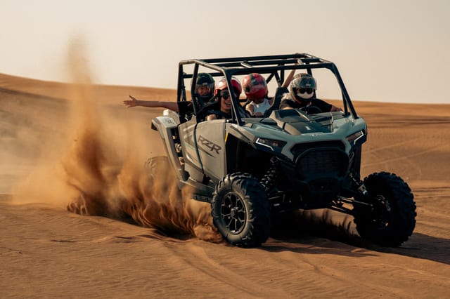 Desert Safari with Quad Bike or Buggy and BBQ Dinner in Dubai
