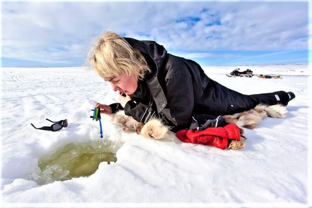 Fisherman’s Luck Snowmobile Ice Fishing in Rovaniemi
