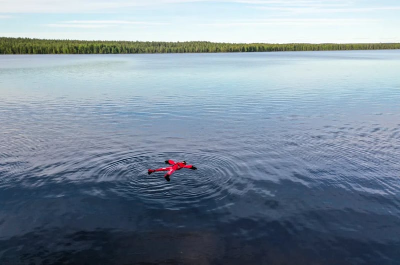 Midnight Sun Floating Experience in Forest Lake, Lapland, photo 3
