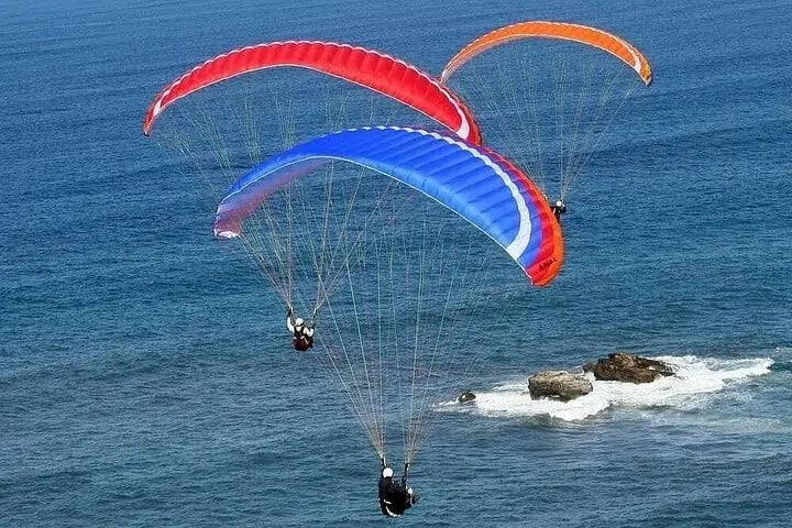 Tandem Paragliding with a Licensed Pilot from Side, photo 4