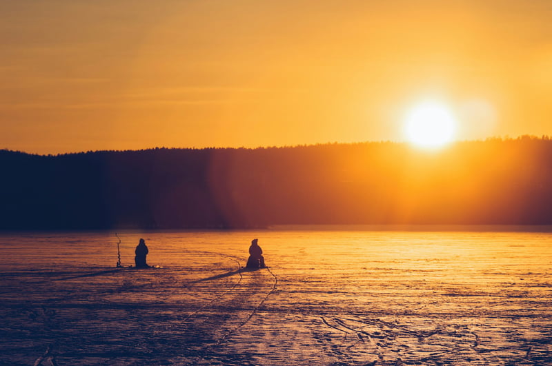 Ice Fishing on a Frozen Lake with BBQ in Lapland, photo 2