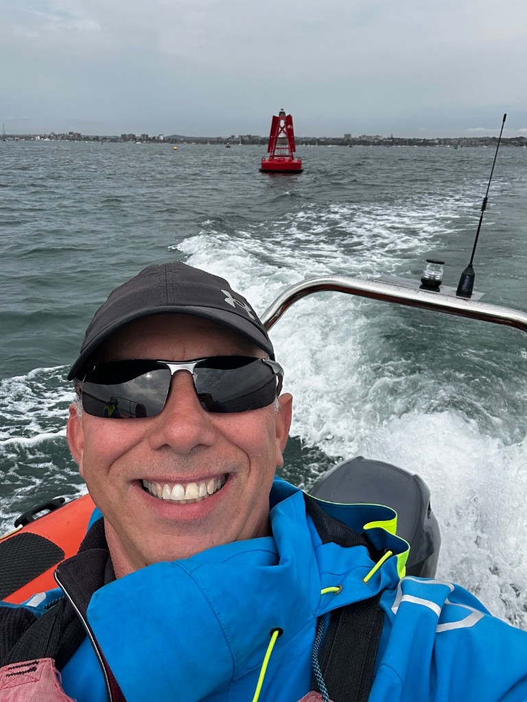 POV from a boat heading out on open water.