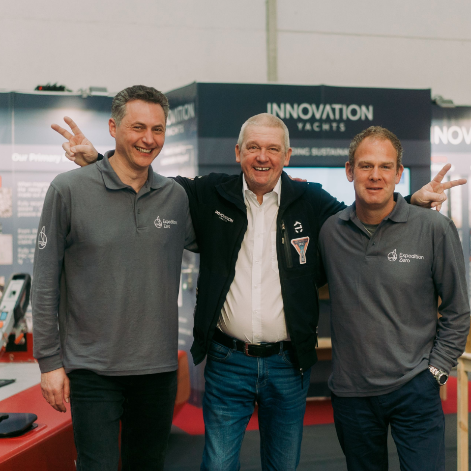 The Expedition Zero team celebrating the launch of the world's first even net-zero yacht.