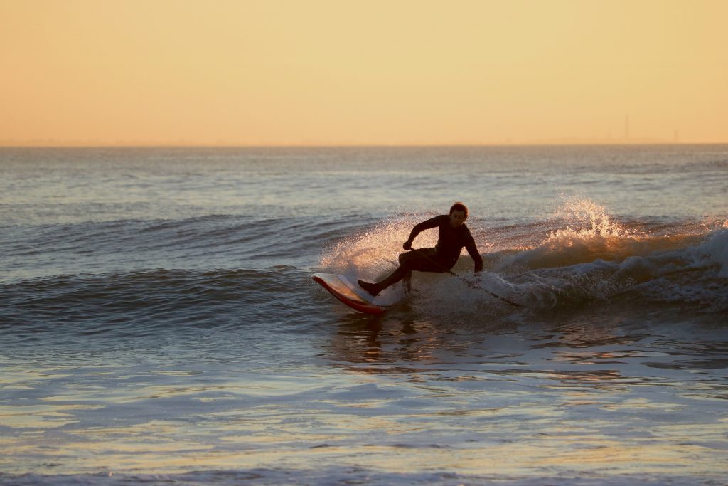 Stand Up Paddle Surfing the waves