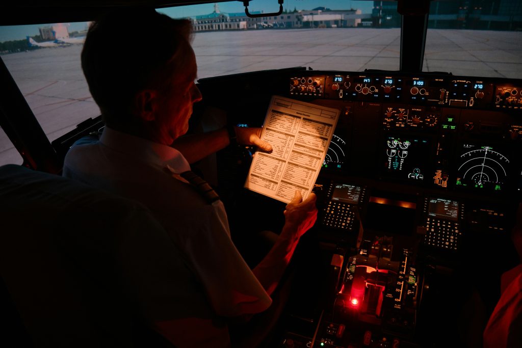 person in a flight simulator